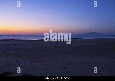 Punta de Tarifa, Punta Marroquí, España, Hiszpania, Spanien, Spanien; Sonnenuntergang über der Straße von Gibraltar. Sonnenuntergang über der Straße von Gibraltar Stockfoto