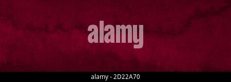 Intensive burgunderrote Farbe von handbemalten Aquarellflecken. Dunkelroter abstrakter Hintergrund mit natürlicher Textur. Stockfoto