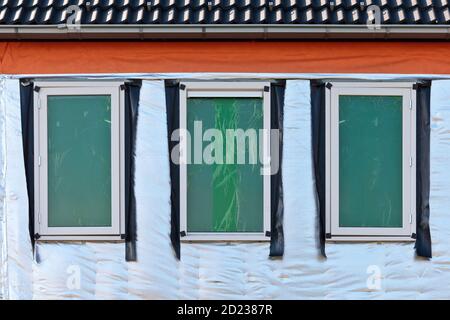 Wärmedämmung an der Wand eines neuen Hauses Stockfoto