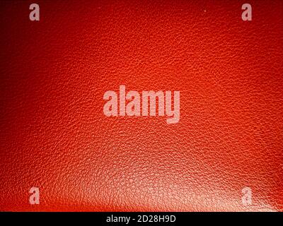 Rotes Leder, rosa Leder oder orange Leder Textur Hintergrund. Kuh Haut oder Schlange Haut für Leder verwendet. Stockfoto