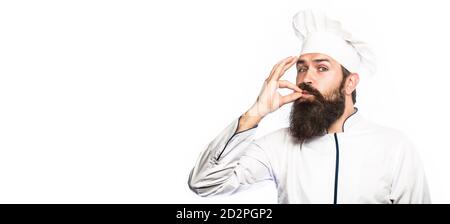 Koch, kochen leckere köstliche Geste durch Küssen der Finger. Bärtiger Koch, Köche oder Bäcker. Bärtige Köche, perfekt. Kochmütze. Speicherplatz kopieren Stockfoto