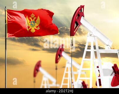 Ölbohrinseln vor dem Hintergrund des bunten Himmels und einer Fahnenstange mit der Flagge Montenegros. Das Konzept der Ölproduktion, Mineralien, Entwicklung von Stockfoto