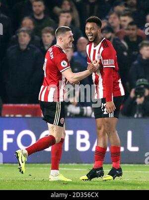 Von Sheffield United Lys Mousset (rechts) feiert zählende zweite Ziel seiner Seite des Spiels mit John Lundstram während der Premier League Match an der Bramall Lane, Sheffield. Stockfoto