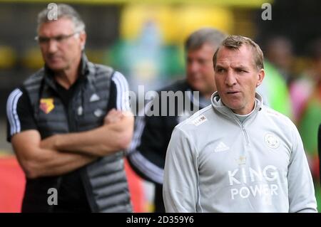 Nigel Pearson, Manager von Watford und Brendan Rodgers, Manager von Leicester City, schauen während des Premier League-Spiels in der Vicarage Road, London. Stockfoto