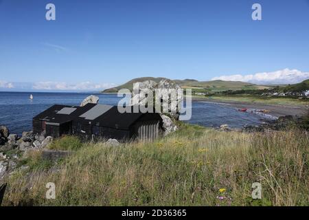 Lendalfoot,Ayrshire, Schottland , 08. August 2019 ​Solo Windsurfer in der Bucht bei Lendalfoot Stockfoto