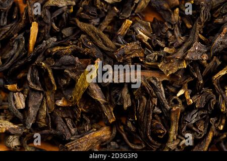 Gerollte lose Blatt Tee aus nächster Nähe. Stockfoto
