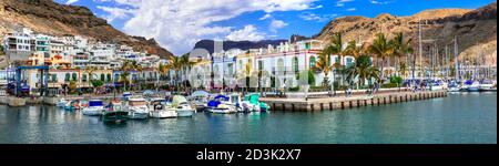 Das Beste von Grand Canary (Grand Canaria) - schönes traditionelles Fischerdorf Puerto de Mogan. Beliebtes Touristenziel, Kanarische Inseln. Panorama Stockfoto