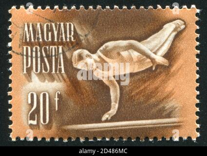 UNGARN - UM 1950: Stempel gedruckt von Ungarn, zeigt Turnerin, um 1950 Stockfoto