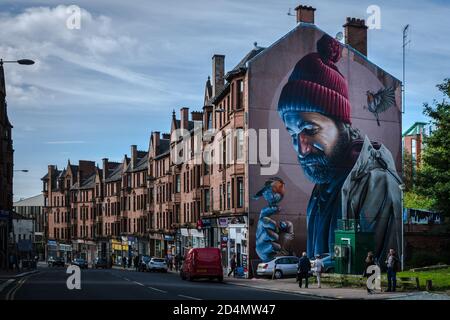 Street Art, Graffiti, an der Fassade eines Gebäudes in Glasgow, Schottland Stockfoto