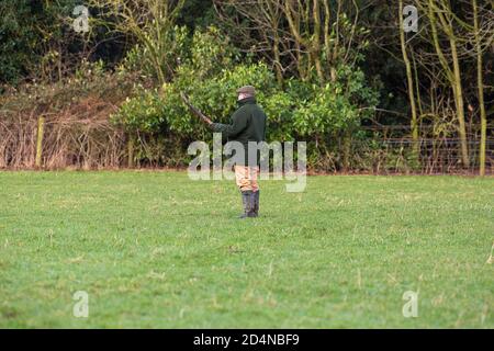 Schläger bei der Arbeit bei einem Game-Shooting in Lancashire, England Stockfoto