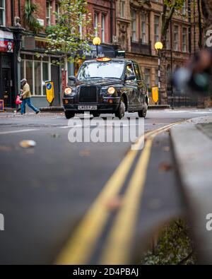 Schwarze Taxis in London Stockfoto