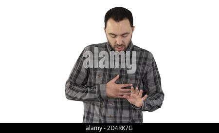 Attraktiver junger Mann müde nach dem Laufen auf weißem Hintergrund. Stockfoto