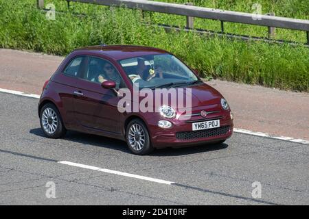 2016 Red Fiat 500 POP Star; Fahrzeugverkehr, Fahrzeuge bewegen, Autos, Fahrzeug fahren auf britischen Straßen, Motoren, Fahren auf der Autobahn M6 Autobahn UK Straßennetz. Stockfoto