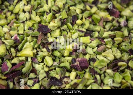 Hintergrund mit Körnern von Bronte grünen Pistazien Textur Stockfoto