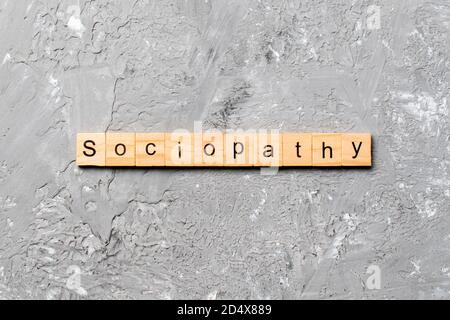 Sociopathy Wort auf Holz Block geschrieben. sociopathy Text auf Tisch, Konzept. Stockfoto