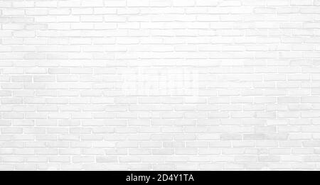 Hellweiße Ziegelwand mit Highlights und Schattierungen in einem Grobe Grunge-Textur Stockfoto
