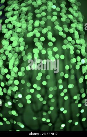 Hintergrund der funkelnden Defokussierten und verschwommenes Licht abstrakt bokeh Farbe grün mit Glitzer Kreise mit keine Personen Stockfoto