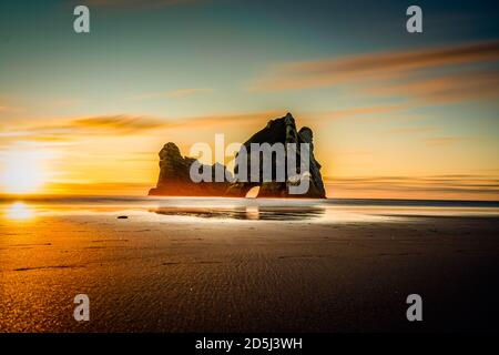 Ein Tag am Whakariki Beach - Fabian Andriessen Stockfoto