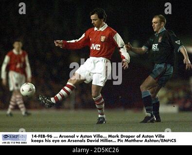 14-FEB-96 ... Arsenal V Aston Villa. Mark Draper von der Aston Villa hat den David Hillier von Arsenal im Auge Stockfoto