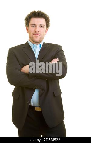 Junger Mann in Geschäftskleidung kreuzt seine Arme Stockfoto
