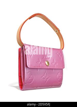 Louis Vuitton Handtasche in leuchtendem Pink auf einem weißen Armband fotografiert Hintergrund Stockfoto