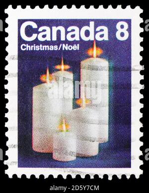 MOSKAU, RUSSLAND - 30. SEPTEMBER 2020: Briefmarke gedruckt in Kanada zeigt Kerzen, Weihnachten (1972) Serie, um 1972