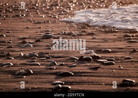 Neuseeland, Südinsel, Hokitika, Steinen am Strand Stockfoto