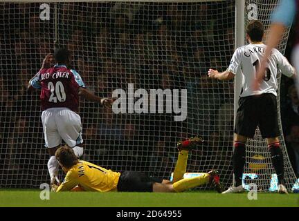 Nigel REO-Coker von West Ham United erzielt das Eröffnungziel von Das Spiel Stockfoto