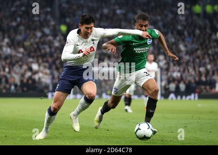 Tottenham Hotspur's Son Heung-min (links) und Brighton & Hove Albion's Bernardo Kampf um den Ball Stockfoto