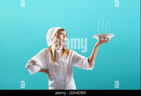 Happy Chef kocht ein neues süßes kreatives Rezept Stockfoto