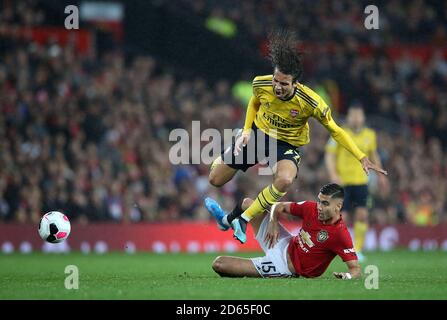 Arsenals Matteo Guendouzi (links) und Andreas Pereira von Manchester United kämpfen um den Ball Stockfoto