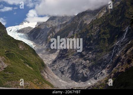 Franz Josef Glacier, einem Gletscher schmelzen aufgrund des Klimawandels, Franz Josef, Südinsel, Neuseeland Stockfoto