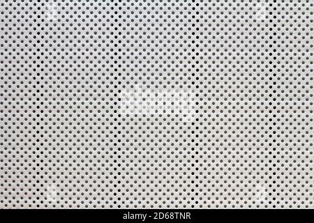 Grau und schwarz kleine Tupfen Muster, abstrakter Hintergrund mit Löchern Stockfoto