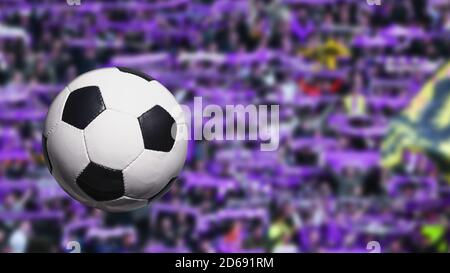 Fußball auf unscharfem Hintergrund. Fußballfans. Nahaufnahme Stockfoto