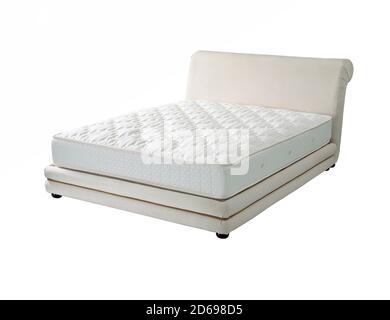 Bettgestell mit gepolstertem Kopfteil und Matratze Stockfoto