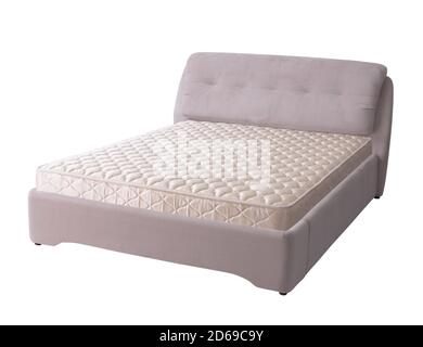 Bettgestell mit gepolstertem Kopfteil und Matratze Stockfoto