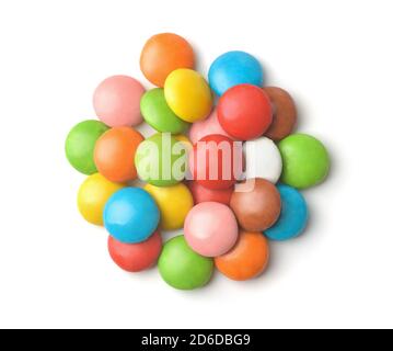 Stapel von bunten glasierten Knopf Bonbons auf weiß isoliert Stockfoto