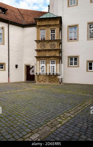 Deutschordensschloss in der historischen, denkmalgeschützten Altstadt von Münnerstadt, Unterfranken, Bayern, Deutschland Stockfoto