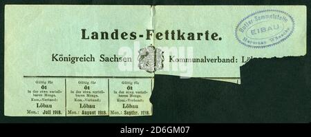 Europa, Deutschland, Sachsen ( Königreich Sachsen ) , Löbau, Zeit des 1. Weltkrieges , Lebensmittelkarte für Fett ( Landesfettkarte ) , für Öl, mit einem Stempel der Butter-Sammelstelle von Hermann Wünsche in Eibau , herausgegeben vom Kommunalverband Löbau , gültig vom Juli bis September 1918 , Größe 19,3 cm x 7 cm , Motiv darf nur für journalistische oder wissenschaftliche Zwecke genutzt werden, Rechte werden nicht vertreten . / Europa, Deutschland, Sachsen (Königreich Sachsen), Löbau, Zeit des Ersten Weltkrieges, Rationsmarken für Fett, für Öl, auch sehen Sie einen Stempel der Buttersammelstelle von Stockfoto