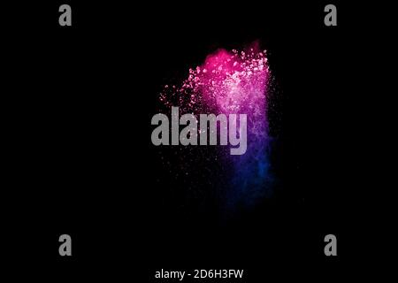 Frostbewegung von bunten Staubpartikeln Spritzer. Lackiertes Holi-Pulver. Stockfoto