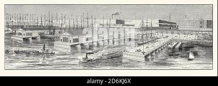 Ein alter Stich zeigt einen Plan für die Fassade des Hudson River am Ostufer entlang der West Street, New York City, USA um 1870. Es ist aus einem viktorianischen Maschinenbaubuch der 1880er Jahre. New York City brauchte mehr Kapazität für die Schifffahrt. Eine Reihe von Piers wurden schließlich von dem Architekturbüro Warren und Wetmore entworfen. Der Komplex bestand aus einer Reihe von großen Gebäuden, die mit rosafarbenen Granitfassaden mit Pfeilern verziert waren, die die Anlegepunkte für Ozeandampfer der Cunard Line und der White Star Line aus dem frühen 20. Jahrhundert bildeten. Die Piers werden jetzt vom Chelsea Piers Sports & Entertainment Complex genutzt. Stockfoto