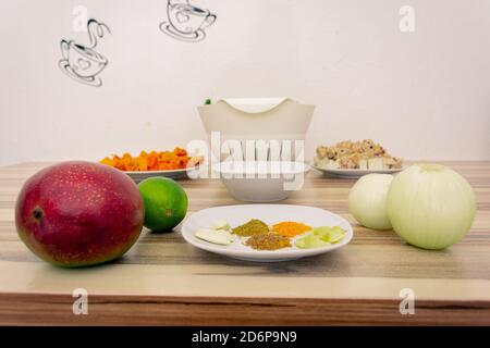 Verschiedene Zutaten und Gewürze für eine vegetarische Mahlzeit in der Küche Stockfoto