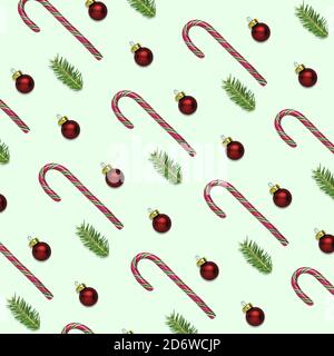 3D-Illustration von weihnachten oder Neujahr grünen Hintergrund mit Zuckerrohrstäbchen, roten Kugeln und Tannenzweigen. Geschenkpapier-Konzept für den Winter Stockfoto