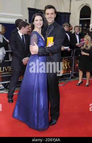 Emma Williams und Michael Xavier kommen am 2011 Laurence an Olivier Awards am Theatre Royal in London Stockfoto