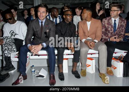 David Gandy, Tinie Tempah und Reggie Yates in der ersten Reihe bei der Katie Eary Modenschau, die im Victoria House während der London Collections: Men stattfand. Stockfoto