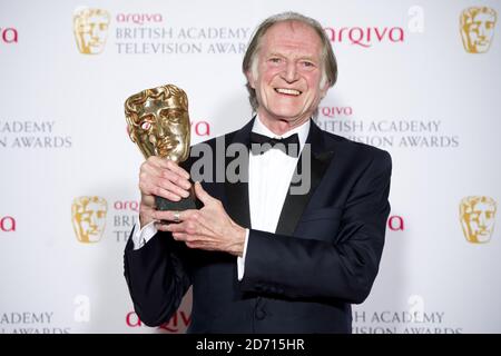 David Bradley mit dem Supporting Actor Award für Broadchurch bei den Arqiva British Academy Television Awards 2014 am Theatre Royal, Drury Lane, London. Stockfoto