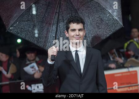 Damian Chazelle bei der Whiplash-Premiere, die im Rahmen des BFI London Film Festival im Odeon Cinema am Leicester Square in London stattfand. Stockfoto