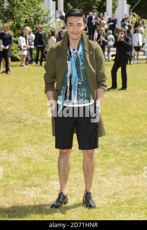 Bing Hu Teilnahme an der Burberry Prorsum Men's Fashion Show im Rahmen der London Collections: Men SS16 Kollektion, gehalten im Perks Field, Kensington Gardens, London (Pflichtangabe: MATT CROSSICK/ EMPICS Entertainment) Stockfoto