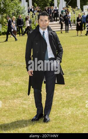 Masahiro Motoki bei der Burberry Prorsum Men's Fashion Show im Rahmen der London Collections: Men SS16 Kollektion, gehalten im Perks Field, Kensington Gardens, London (Pflichtnachweis: MATT CROSSICK/ EMPICS Entertainment) Stockfoto