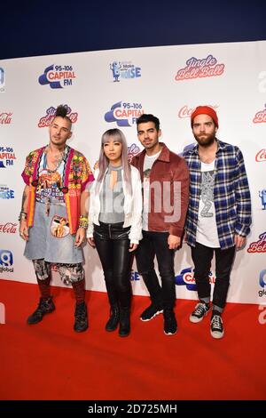 (Links-rechts) Cole Whittle, JinJoo Lee, Joe Jonas und Jack Lawless von DNCE während des Capital's Jingle Bell Ball mit Coca-Cola in der Londoner O2 Arena. Bilddatum: Sonntag, 4. Dezember 2016. Bildnachweis sollte lauten: Matt Crossick/ EMPICS Entertainment. Stockfoto